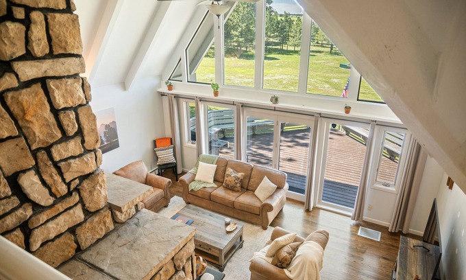Larkspur House | Pikes Peak Views Sleeps 15 Hot Tub Wood Fireplace 5 Acre Retreat