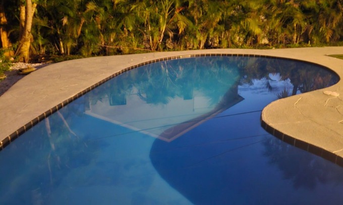Redington Beach House | Pool Home one block from the beach with Putting Green