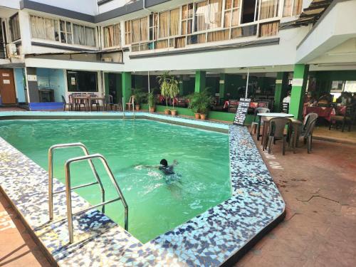 Calangute Apartment | Pool Side Resort Apartment with kitchen in near Calangute Beach