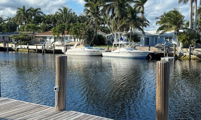 Harbor Village Condo | Poolside 2BR Retreat Canal Dock 6 minutes Walk to the Beach