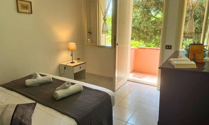 Furnari Apartment | [Portorosa Residence] Canal apartment with a view