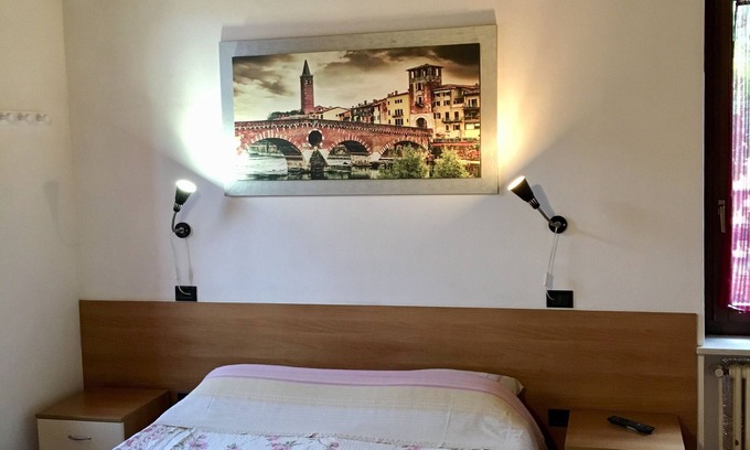 Borgo Roma Apartment | Practical comfortable apartment in the center and station, free Wi-Fi