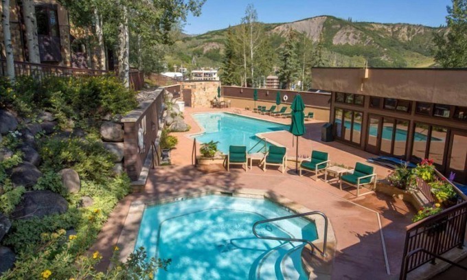 Snowmass Village Cabin | Premier Ski in, Ski out 2 Bedroom Colorado Vacation Rental Steps From the Ski Slopes With Hot Tub and Pool