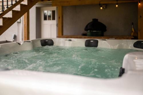 St. Charles Apartment | Private Basement - Two King Beds and Hot Tub