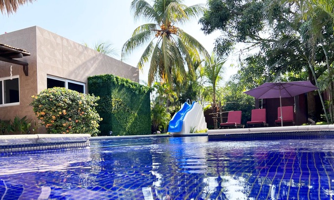 Puerto San Jose Ski Chalet | Private family house, with pool, water slide and swings.