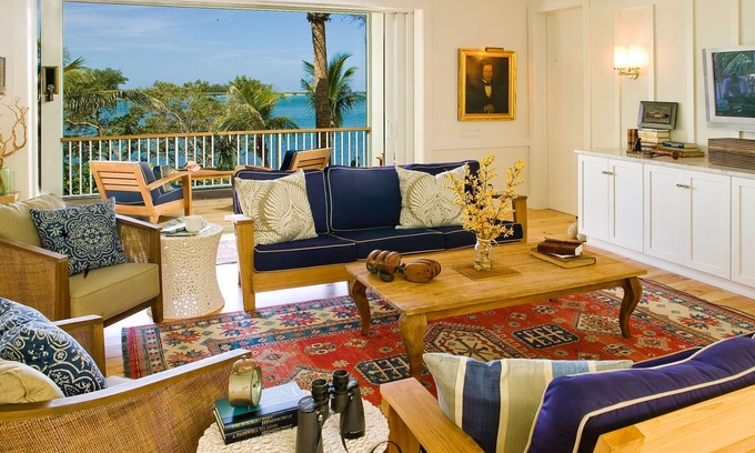 Whitney Beach House | Private Island Retreat with Private Beach, Dock, Palm Trees & Glorious Sunsets