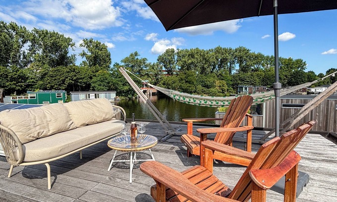 Stadionbuurt Boat Rental | Private watervilla 60m² nearby Amsterdam centre+ rooftop terrace