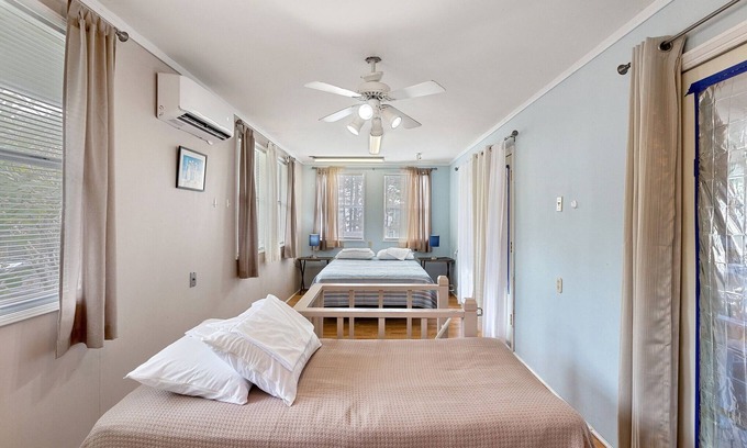 Eastpoint House | Pura Vida East Point Apartment with Bay and Island View by RedAwning