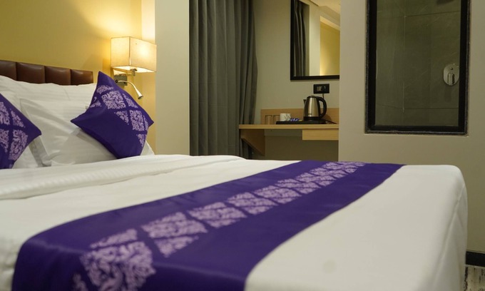 Surat Hotel | Purple Beds by VITS Dwarkesh, Surat