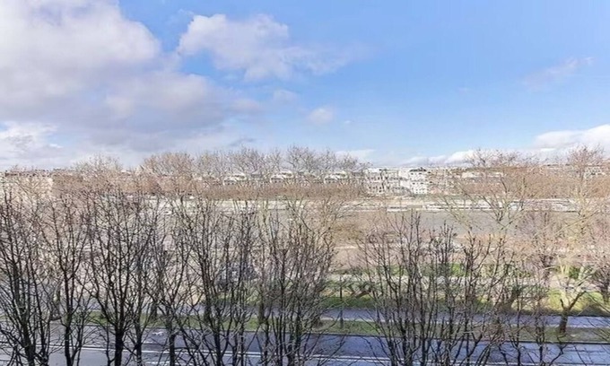 Quartier du Gros-Caillou Apartment | QUAI D'ORSAY(SEINE BELOW YOUR FEET)WITH MODERN, WARM & LUXURIOUS INTERIORS