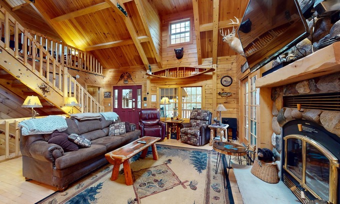 Minocqua House | Quaint lakefront cabin w/indoor & outdoor fireplace, private dock - dogs OK