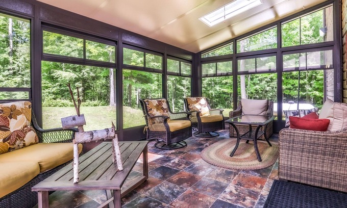 Minocqua Cabin | Quiet cabin with fireplace, lanai, central AC, washer/dryer, WiFi, & Netflix