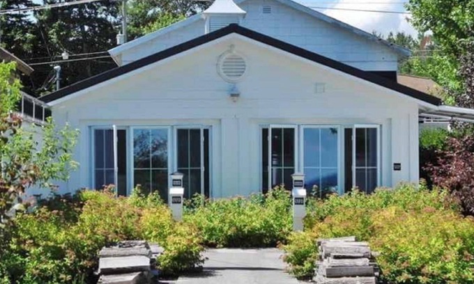 Suttons Bay Cottage | Quiet, Private, Waterfront - Luxury on 125 Ft. of Suttons Bay