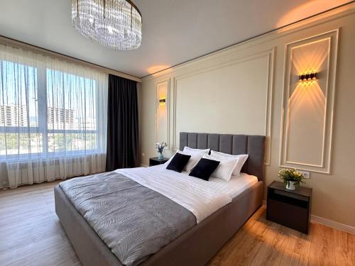 Almaty Apartment | Raiymbek 13-53 & drinking water as a gift