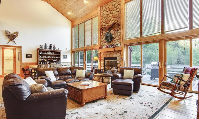Stowe Area House | Redwood: large 8 br home near Trapp Lodge w/fireplace, a/c, game room & deck!