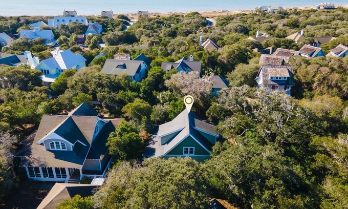 Cape Fear Station House | Reel Life tucked into a pretty, wooded bend in prestigious Cape Fear Station!