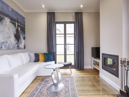 Kreptitz House | Reetland am Meer - Premium Reetdachvilla mit 3 Schlafzimmern, Sauna und Kamin E15