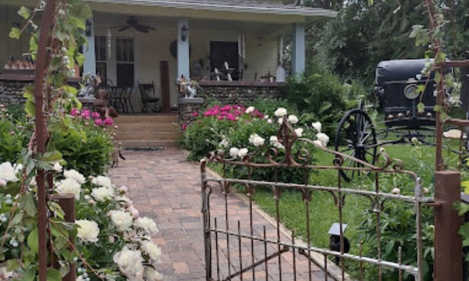 Birchwood Apartment | Relax in our English Garden King Suite at The Cobblestone Bed & Breakfast