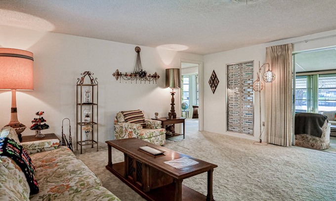 Port Charlotte House | Relax, Work, or Play in this Retro Waterfront Home with Sunsets & Private Dock