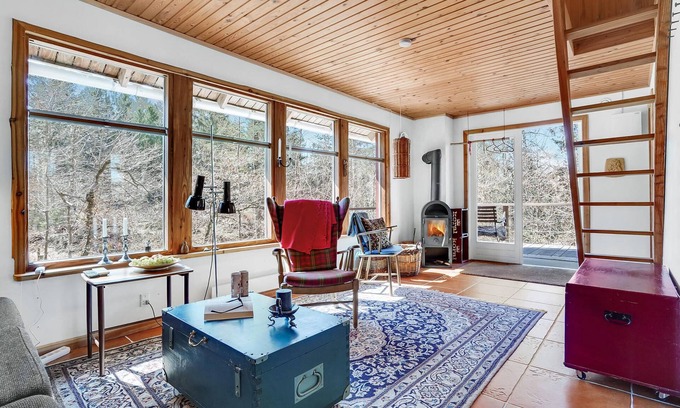 Thorsoe House | Relaxed living in tranquil wooden cottage near forest and meadows.