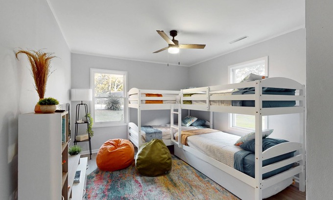 Shell Point House | Remodeled cozy ocean themed home with outdoor seating & firepit