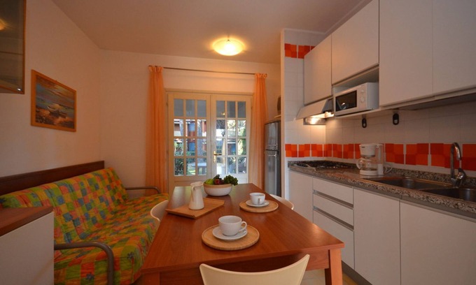 Bibione Apartment | Renewed apartment in a residence with swimming pool by Beahost Rentals