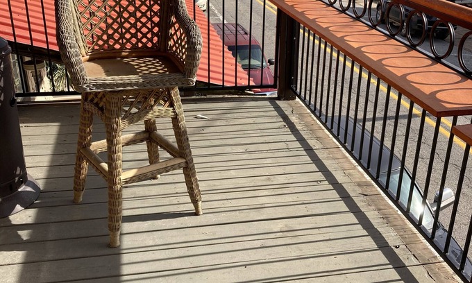 Hardy Condo | Renovated historical hotel. Now a full size condo with game room & balcony.