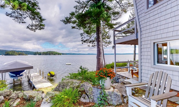 Alton Bay House | Renovated home with a water view, washer/dryer, AC, deck & wood stove