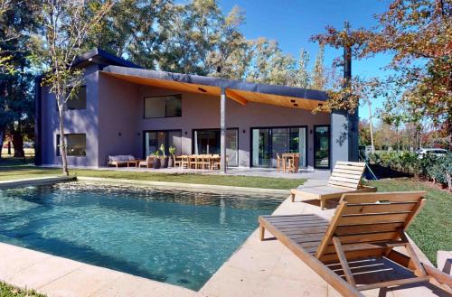 Pilar House | RentUp - Diseño exclusivo espacios unicos Tessalia Casa Polo