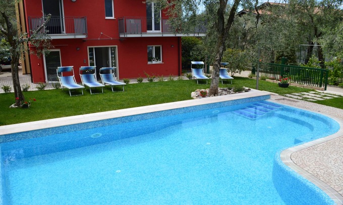 Malcesine Apartment | Residence "La Pergola" central area, garden, swimming pool, parking