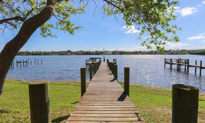 Roseland House | Riverfront Retreat, Private Docks, on Small Acreage.