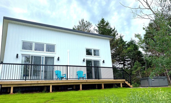 Alberton Cottage | Rivers End Retreat located on cascumpec river. Private hot tub and bunk house.
