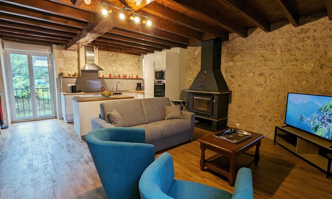 Saint-Aigny Cottage | Riverside Retreat: Historic Watermill with Private Terrace, Fireplace, and Scenic Views in Brenne Park