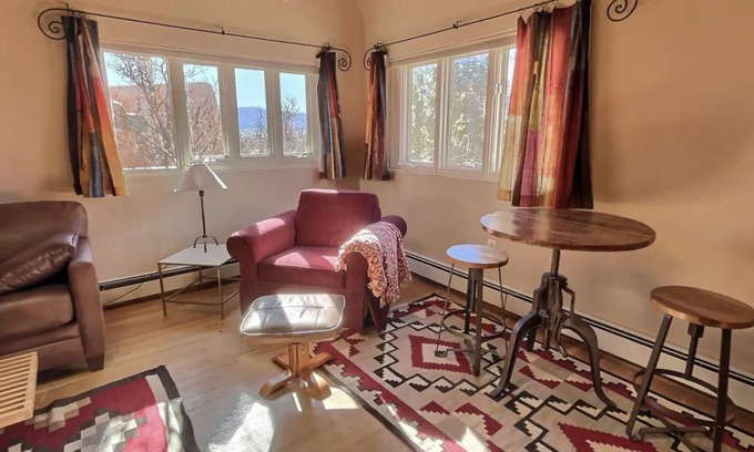 Taos House | Rock Art Retreat—A gorgeous estate full of petroglyphs and colorful artwork.