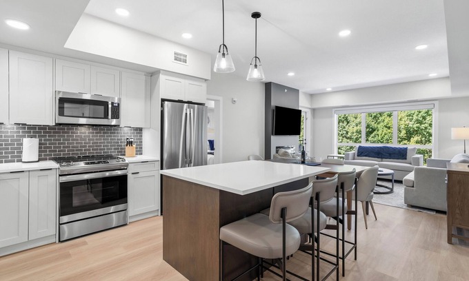 Dead Man's Flats Condo | ☀️Rocky Mountain Creekside Retreat|Top Floor Brand New Unit☀️