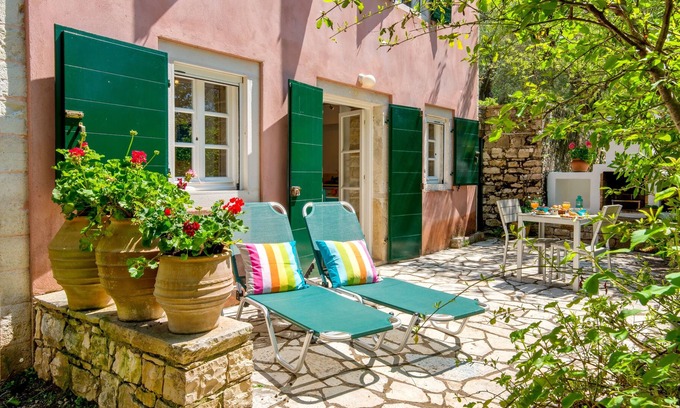 Lakka Apartment | Romantic studio in private olive grove & garden. 5 min walk to beach and village