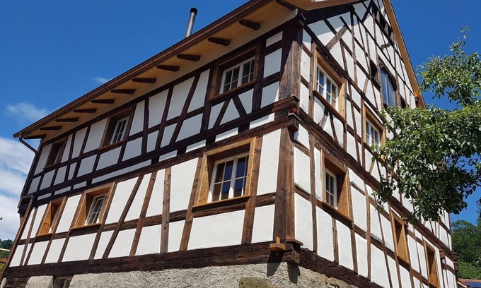 Ludwigshafen Apartment | Romantic vacation apartment in renovated half-timbered house from 1706 with courtyard and garden