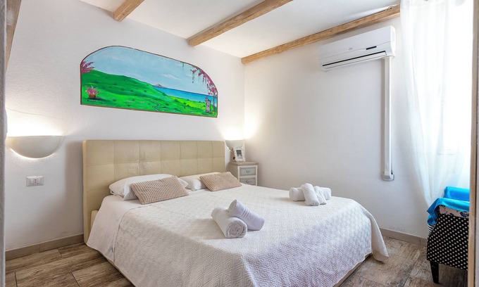 Sorso Apartment | Room 'Oleandro' with Shared Pool, Private Terrace and Air Conditioning