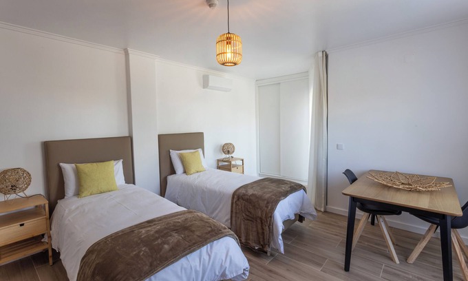 Castelo Apartment | Room with private bathroom and balcony with pool view at Casa das Vinhas in Sesimbra