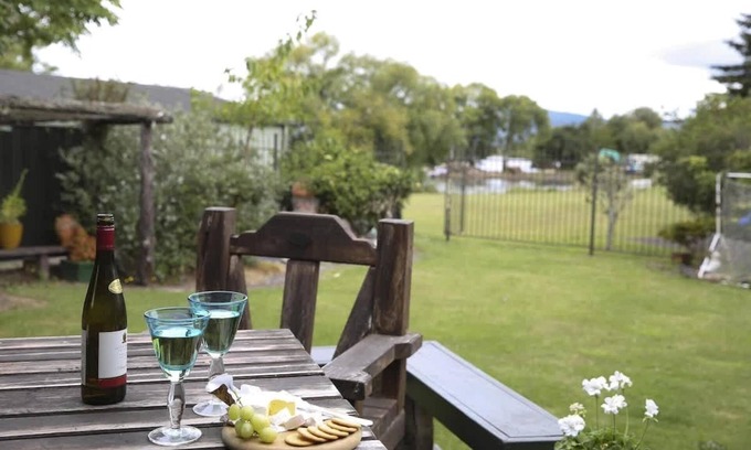 Kawaha Point House | Rose Lake Retreat | Great Lake Views with Spa Pool