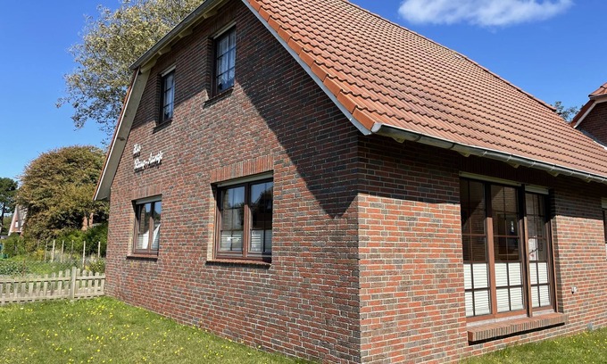 Borkum Apartment | Ruhepol am Meer: Gemütliche Ferienwohnung in Grüner Umgebung