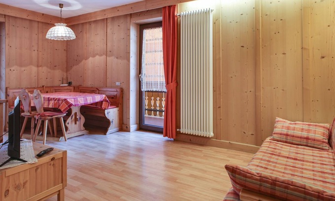Moena Apartment | Rustic Apartment Casa March 1 with Wi-Fi, Balcony, Garden & Mountain View