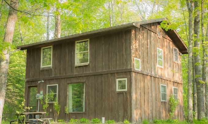 Finlayson Cabin | Rustic Two Level Tree Lodge Surrounded By The Forest With Fireplace And Fire Pit