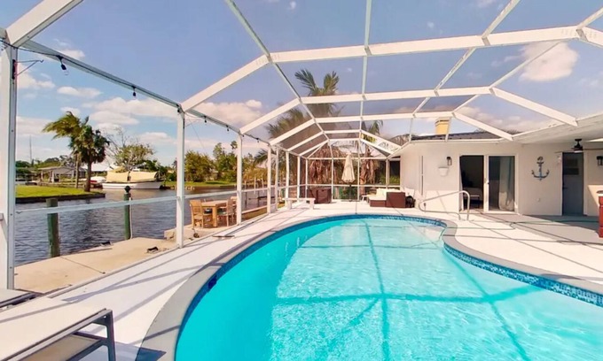 Fort Myers House | Sailors Paradise-Waterfront Gulf & Sailboat access with AC, WIFI, heated Pool!