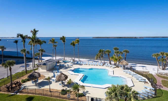Punta Rassa Condo | Sanibel Harbour Resort Harbour Tower 211: Boasting amazing sunset views from the lanai