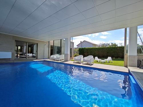 Sanxenxo House | Sanxenxo Casa Rial 47 con PISCINA CLIMATIZADA