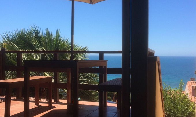 Funtana Meiga Apartment | Sardinia Funtana Meiga Apartment with sea view CIN IT095018C2000S4495