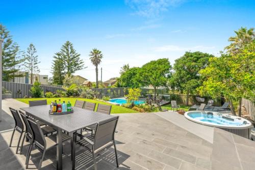 Culburra Beach House | Sea La Vie - Pet Friendly with Fireplace and Swimming Pool & Spa
