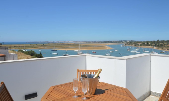 Alvor House | Seaview Townhouse by the riverside in the centre of Alvor (with terrace)