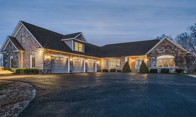Sunrise Bay House | Secluded lakefront home with elevator, dock, private saltwater pool & hot tub